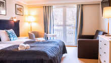 Et eksempel på et af hotellets standard dobbeltværelser med op til to ekstra opredninger.