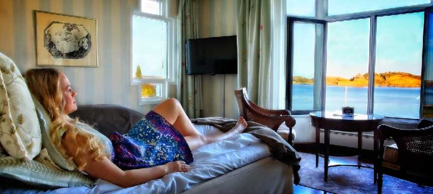 Tag på en dejlig ferie i Norge på historisk hotel med flot beliggenhed tæt på vandet.