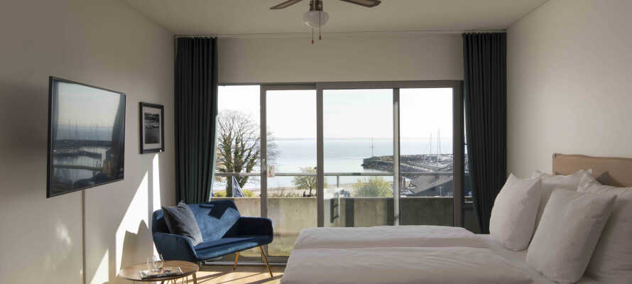 Hotellets lyse og rummelige dobbeltværelser tilbyder en behagelig base i en enkel og moderne indretning.