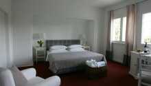 Hotellets værelser tilbyder et 4-stjernet komfortniveau
