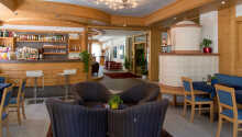 Hotellet er indrettet i en skøn alpestil, og tilbyder en varm og indbydende atmosfære.