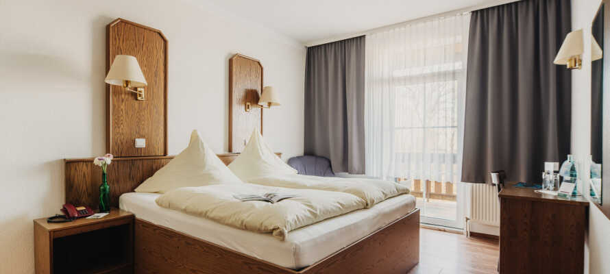 Hotellets værelser giver jer god komfort og indbyder til afslapning under opholdet.